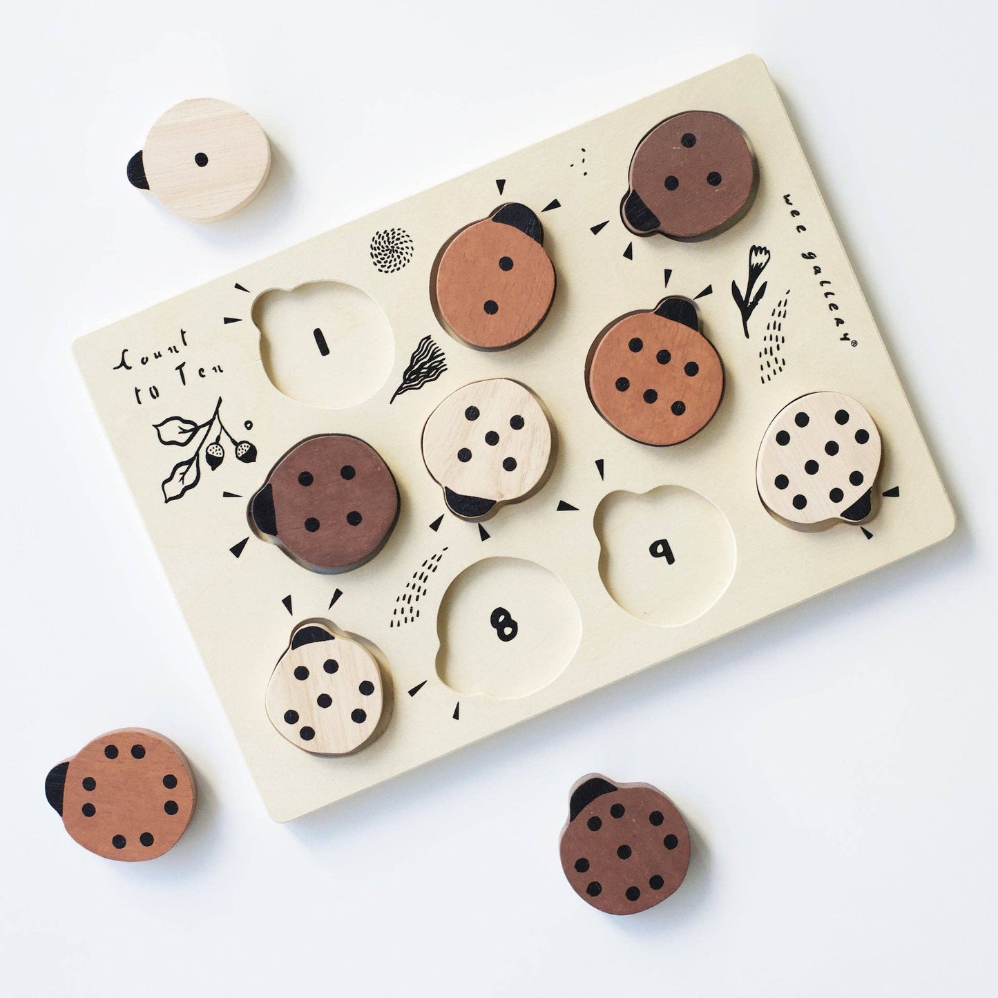 ladybug wooden tray puzzle in use